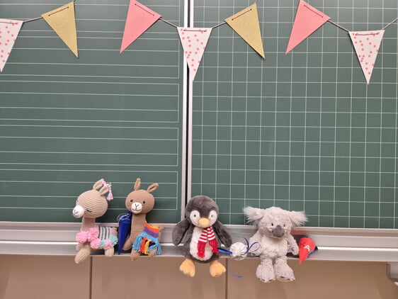 Unserer Maskottchen: 1a Lama, 1b Pinguin, 1c Koala