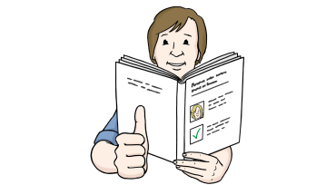 Person liest ein Buch und zeigt Daumen hoch.