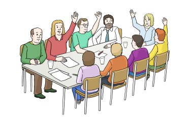 Gruppe von acht Personen sitzt an einem Tisch, einige heben die H&auml;nde.
